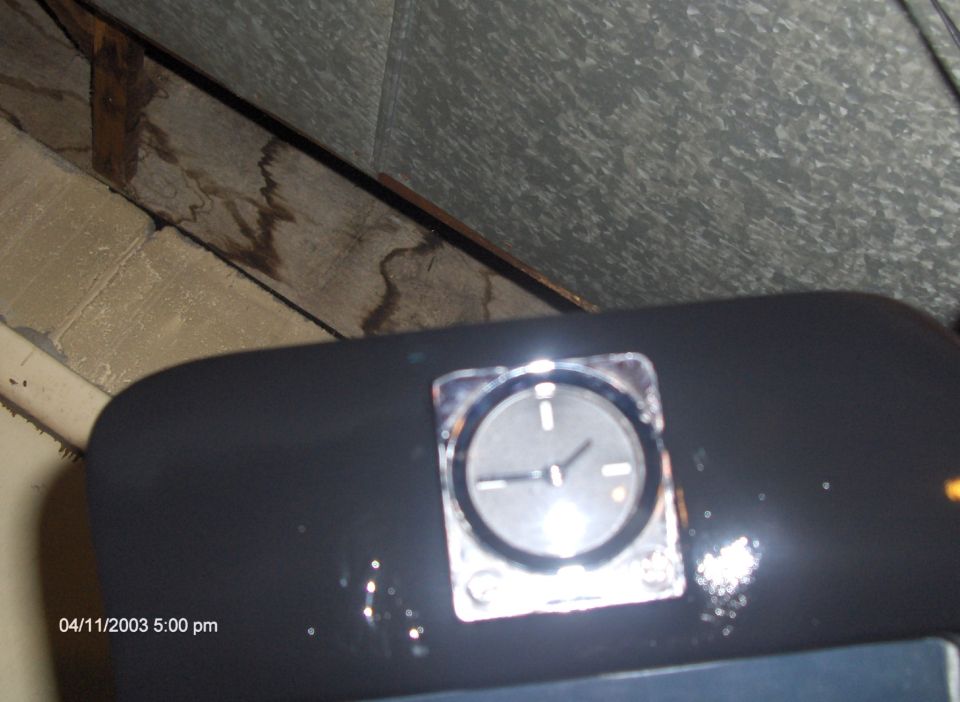 car dashboard clock with chrome trim