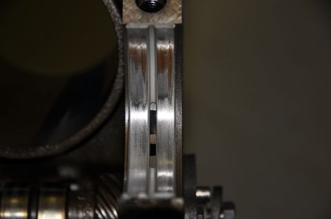 1996 Ford Bronco - This image shows a close-up view of an engine bearing, highlighting wear and tear.