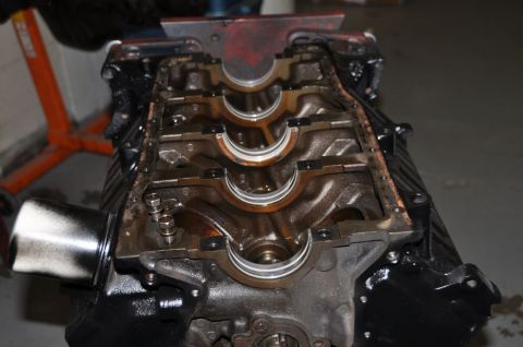 1996 Ford Bronco - Engine block with crankshaft bearings exposed, likely during a rebuild or inspection.