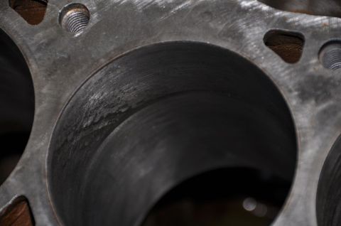 1996 Ford Bronco - This is a close-up view of an engine's cylinder block, showing the internal surfaces of the cylinders.