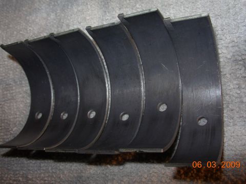 1995 Ford Taurus - A set of engine bearings are shown, with a date stamp of 06.03.2009 visible in the lower right corner.