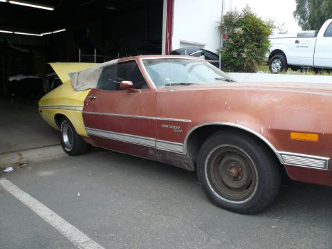 1975 Ford Ranchero - This 1975 Ford Ranchero shows a two-tone paint scheme with the rear section in yellow and the front in red.