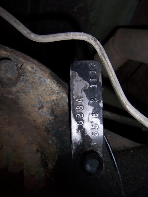 1991 Ford Bronco - Close-up of a VIN tag showing identification numbers.