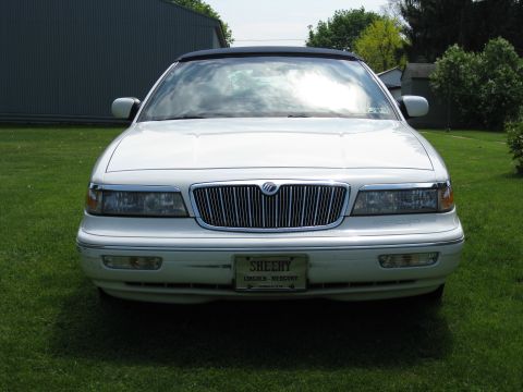 1996 Mercury Grand Marquis - This 1996 Mercury Grand Marquis is shown from the front, its distinctive grille and a license plate frame from Sheehy Lincoln-Mercury.