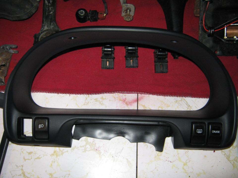 Dashboard instrument cluster with fog light and cruise control buttons