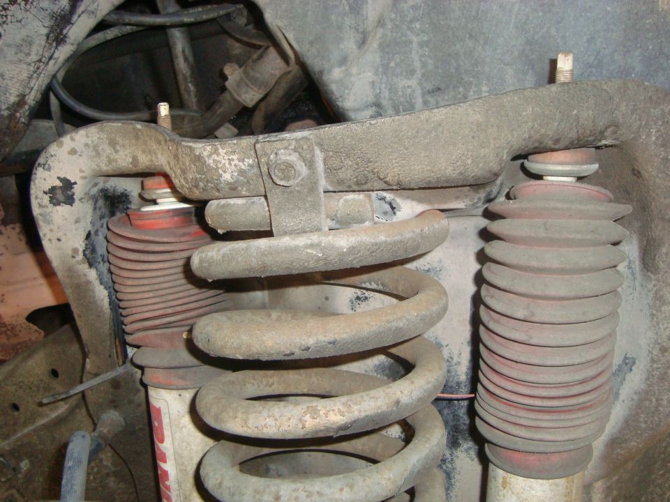 Front suspension coil spring and red bellows shock absorber