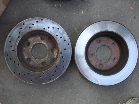 1990 Ford Taurus - Comparison of a drilled and slotted brake rotor with a standard solid brake rotor.