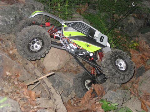 2010 Ford Pickup - Remote controlled rock crawler scales a challenging obstacle course of rocks and dirt.