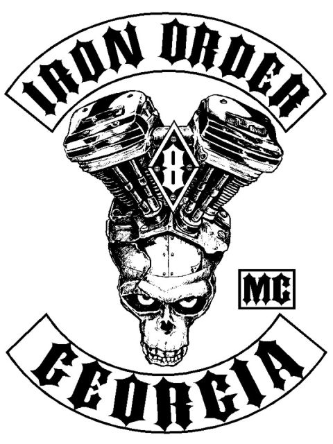 2006 Harley-Davidson Sportster Custom - This image displays a black and white graphic a V-twin motorcycle engine above a skull, with text elements forming a club patch.