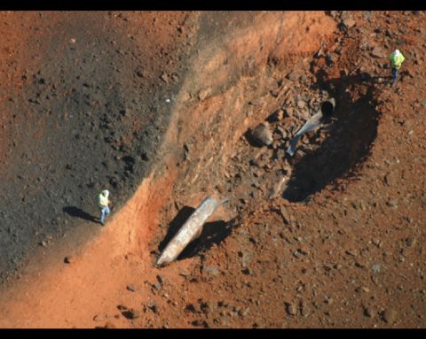 1978 Ford Bronco - The surface of Mars shows a rocky terrain with dark shadows.