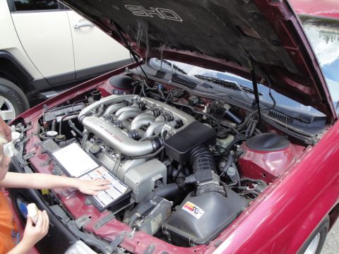 1990 Ford Taurus - Engine bay of a 1990 Ford Taurus SHO, showing the V6 24-valve DOHC engine.