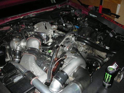 1992 Ford Crown Victoria - Custom engine bay modifications twin Vortech superchargers, with a Monster Energy drink can visible.