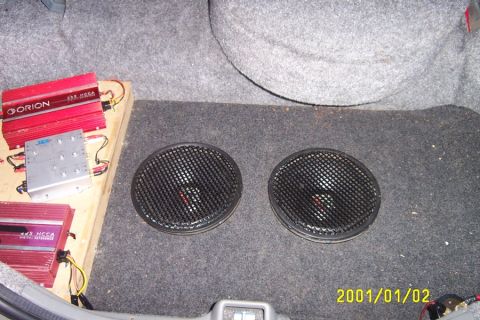 1992 Mercury Grand Marquis - My trunk. 2x12" Orion XTR 500 watt subwoofers 2x225 watt orion amplifiers 1x3-way electronic active crossover 1 farad capacitor sub box is…