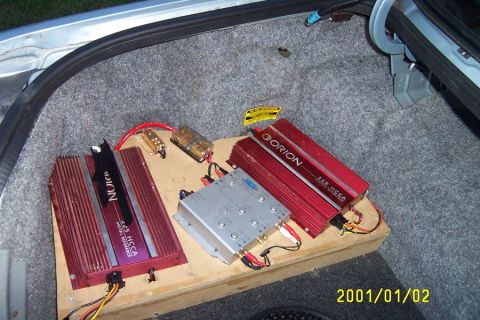 1992 Mercury Grand Marquis - Amps and Crossover, and protection fuses and pwer distribution box.
