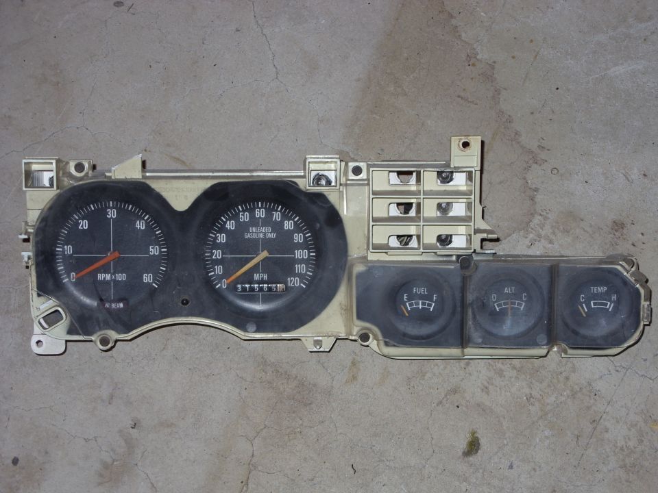 Vehicle instrument cluster showing RPM, MPH, Fuel, Alt, and Temp gauges