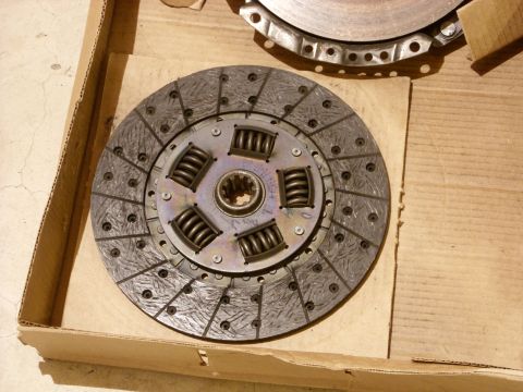 1988 Ford Bronco - Clutch disc and pressure plate assembly, likely for a vehicle, shown in a cardboard box.