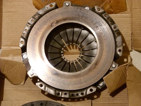 1988 Ford Bronco - Close-up of a vehicle clutch pressure plate, a component of the drivetrain system.