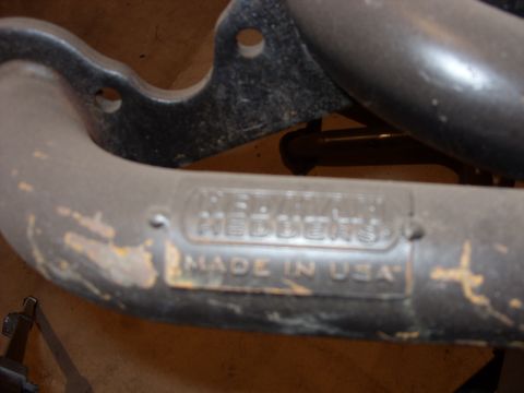 1988 Ford Bronco - Close-up of an exhaust manifold showing manufacturer's stampings.