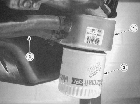 2007 Ford Mustang - Close-up view of engine oil filter and associated parts, with labels indicating part numbers and manufacturer.