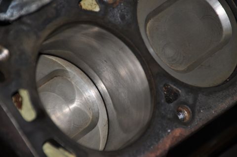 1996 Ford Bronco - Close-up view of an engine cylinder, showing the piston within its bore.