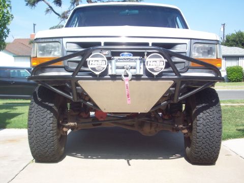 1995 Ford Bronco - Front view of a 1995 Ford Bronco equipped with an aftermarket bumper and winch.