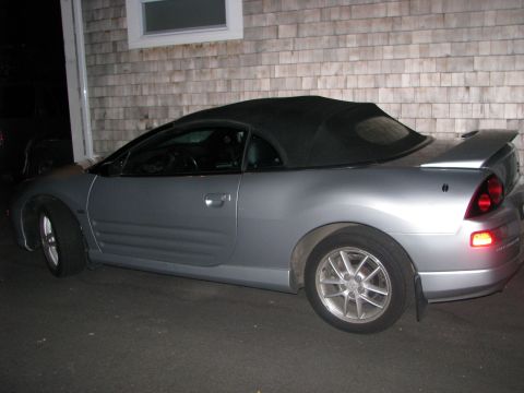 2001 Mitsubishi Eclipse - This silver 2001 Mitsubishi Eclipse convertible is seen from the side.