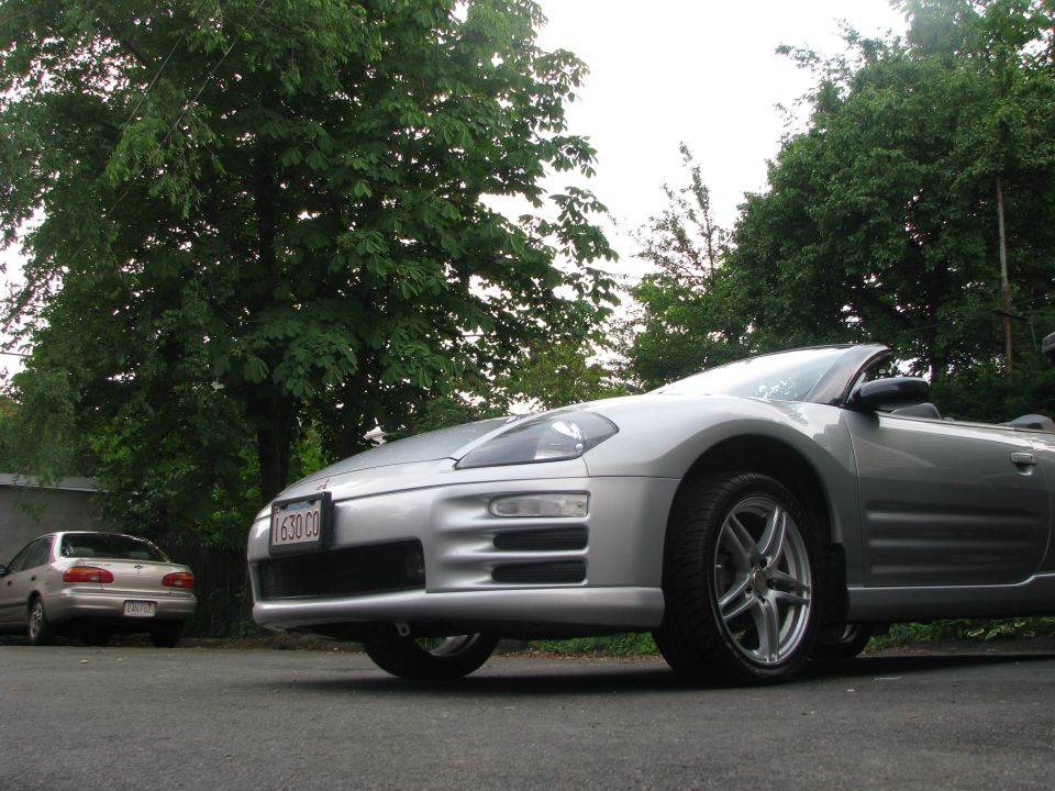 2001 Mitsubishi Eclipse convertible parked on asphalt, another car in background