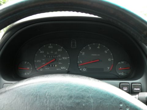 1998 Subaru Legacy - The dashboard of a 1998 Subaru Legacy shows an odometer reading of 150,768 miles.