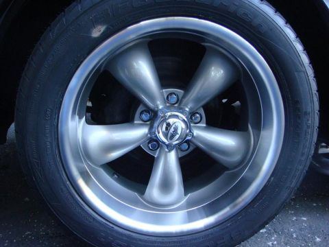 1975 Chevrolet Corvette - Aftermarket wheel and tire assembly, likely for a classic car.