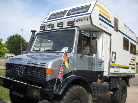 1995 Ford Bronco - This Unimog features a Bimobil camper conversion, indicating its purpose for overland travel.