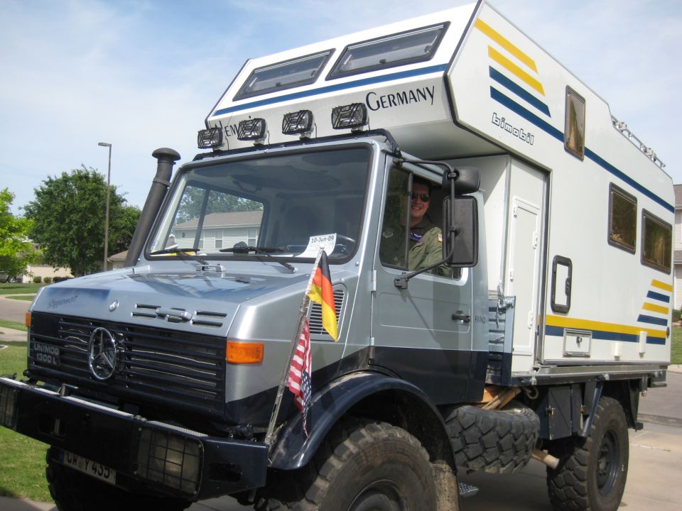 Mercedes-Benz Unimog truck with a Bimobil camper body, has 'Germany' text on top