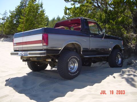 1989 Ford Bronco - This lifted Ford Bronco is shown on sand dunes, with a date stamp of July 19, 2003.