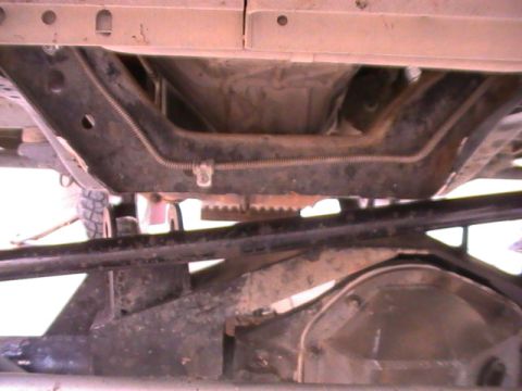 1997 Ford Ranger - Close-up of the underbody frame and suspension components, showing rust and wear, with a Supermotors.net watermark.