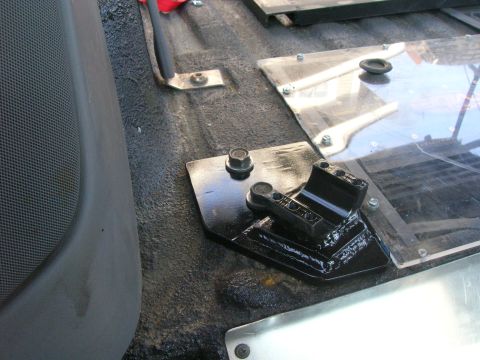 1996 Ford Bronco - Close-up view of aftermarket modifications inside a vehicle's cabin.