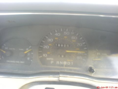 1992 Ford Crown Victoria - Interior view of a car's dashboard with a speedometer and odometer.