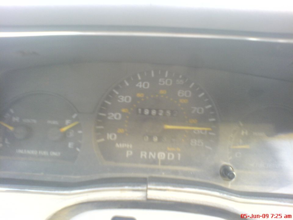 Car dashboard showing speedometer, odometer reading 19825, and gear selector P R N D 1