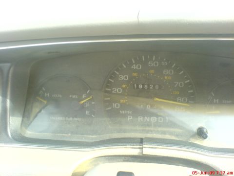 1992 Ford Crown Victoria - The odometer reads 198,263 miles and 404 hours on the dashboard of a 1992 Ford Crown Victoria.