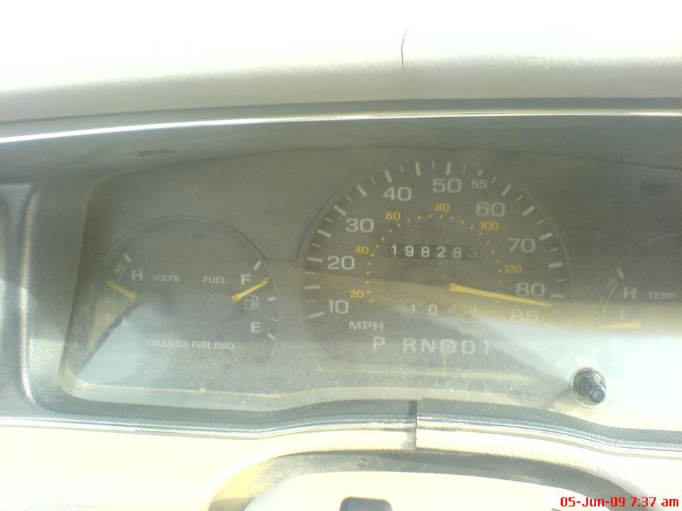 Dashboard gauges showing 198,263 miles and 404 hours. 1992 Ford Crown Victoria
