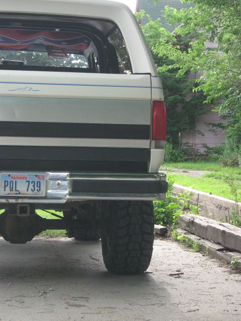 1987 Ford Bronco - Rear view of a 1987 Ford Bronco showing its distinctive body style and taillight.