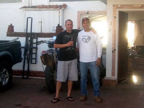 1996 Ford Bronco - Two men pose for a photo with a dirt bike and pickup truck in the background.