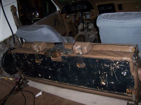1991 Ford Bronco - The interior of a 1991 Ford Bronco shows significant wear and tear, with the dashboard disassembled.