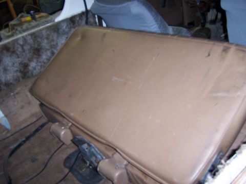 1991 Ford Bronco - Interior view of a vehicle's brown seat, showing signs of use.