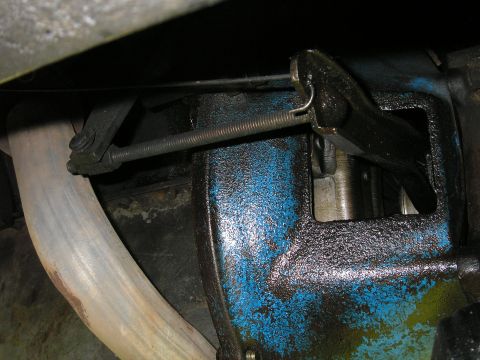 1979 Ford Bronco - Detail of the clutch linkage system, showing the mechanical components and a spring under tension.