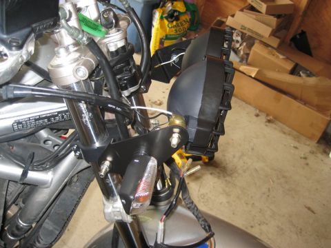 2003 Suzuki Bandit S - Close-up view of a motorcycle's front end, showing the headlight and wiring harness.