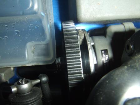 1996 Ford Bronco - A mechanical part with a toothed wheel and warning label is visible in this close-up.