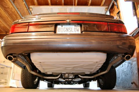 1985 Mercury Grand Marquis - The rear of a 1992 Mercury Grand Marquis is shown, with a view of its exhaust system and undercarriage.