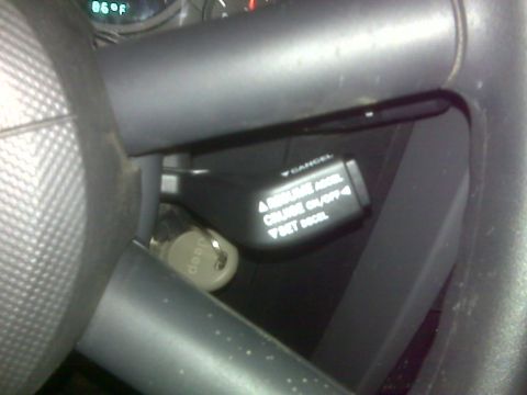 2008 Jeep Wrangler - Close-up of a Jeep's interior showing the cruise control stalk with its operational buttons.
