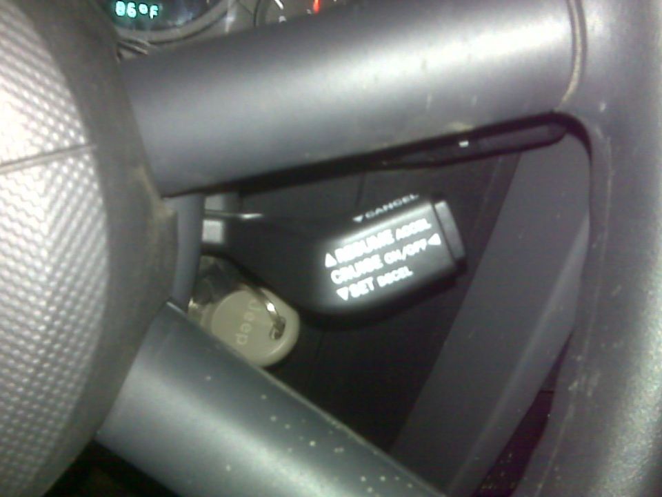 Jeep cruise control stalk with RESUME ACCEL, CRUISE ON/OFF, and SET/DECEL buttons