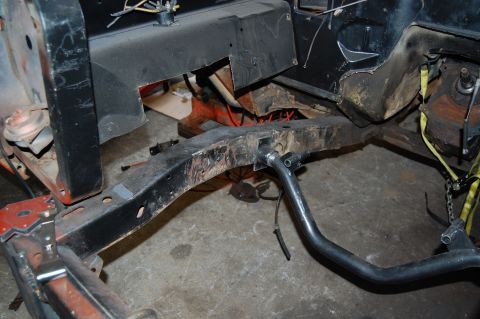 1994 Ford Bronco - Close-up view of vehicle frame and suspension components during a repair or restoration process.