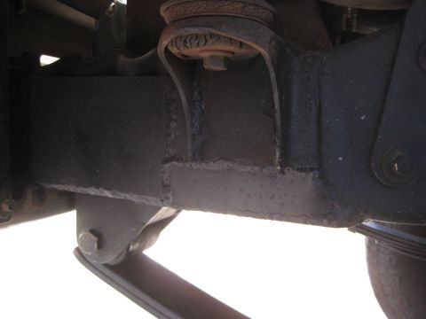 1996 Ford Bronco - Close-up view of vehicle suspension components, a Supermotors.net watermark.